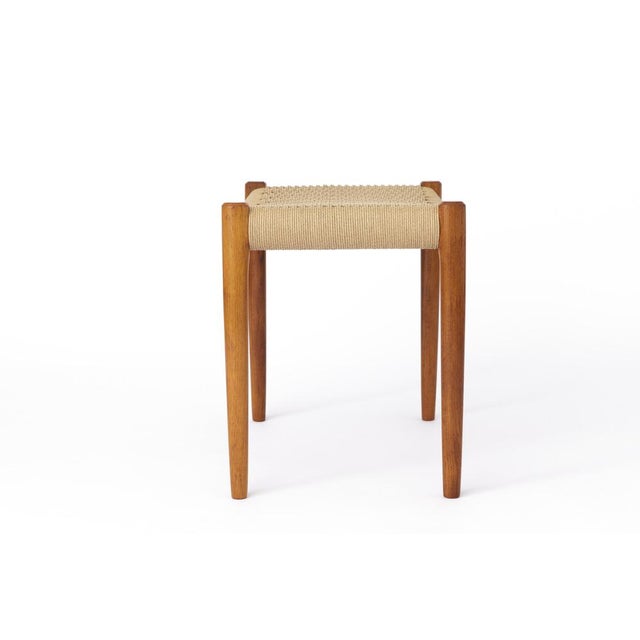 Ottoman by Niels Otto Moller. Model 80A. Production period: 1950s. Very good condition. Teak wood frame refurbished and...