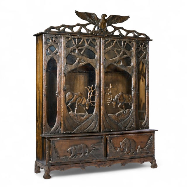 Black Forest Antique Walnut Gun Cabinet This cabinet measures: 72.5 wide x 19 deep x 91.5 inches high ABOUT PHOTOS: We...