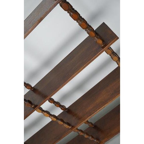 This shelving unit was made around the 1970s in France. It is made from oak and oak veneer and features 6 shelves. The...