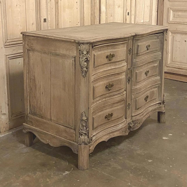 18th Century Country French Provincial Buffet features an arbalette, or archer's bow, facade sculpted and embellished from...
