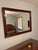 Wild black cherry wood wall mirror by Henkel-Harris. 44.5 inches long 34.5 inches tall