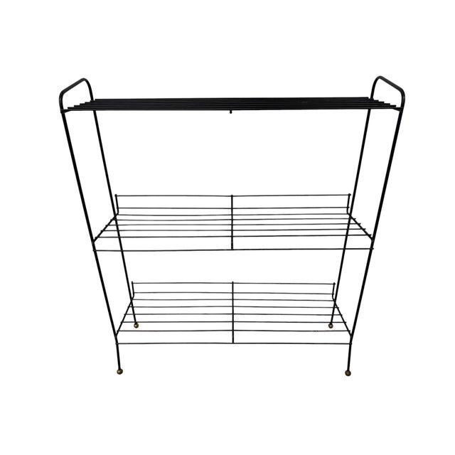 Bring iconic 1960s style into your home with this striking Mid-Century Modern atomic 3-tier plant stand. Featuring a sleek...