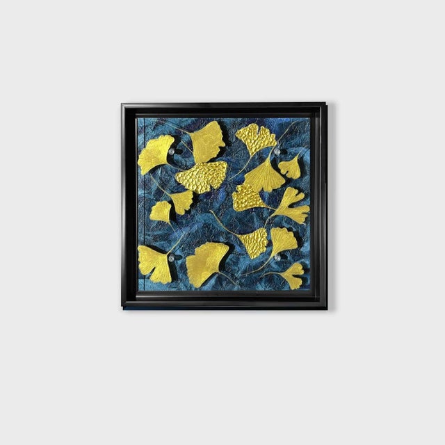 This is a one of a kind original mixed media (Paper, ginkgos, acrylic paint and plexiglass) abstract painting depicting...