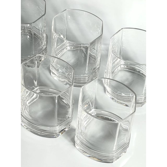 A rare 1970s Christian Dior “Montaigne” crystal barware set, comprising a large decanter with its original stopper and six...