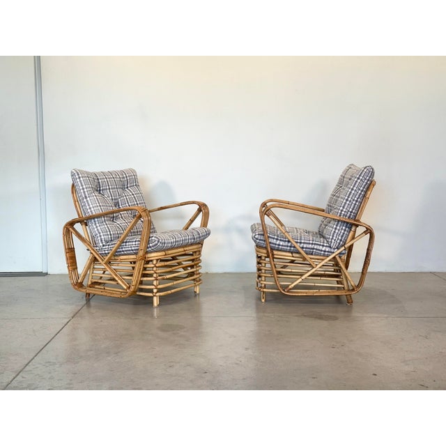 Pair of 1970s rattan and bamboo armchairs, fabric-lined cushions, sofa available upon request, seat height with cushion 45...