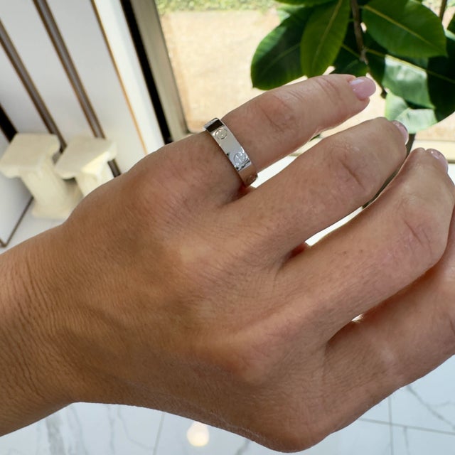 Brand: Cartier Gender: Unisex Metal Type: 18K White Gold Ring Size: 5 Width: 4.00 mm Weight: 4.33 grams CARTIER designer...