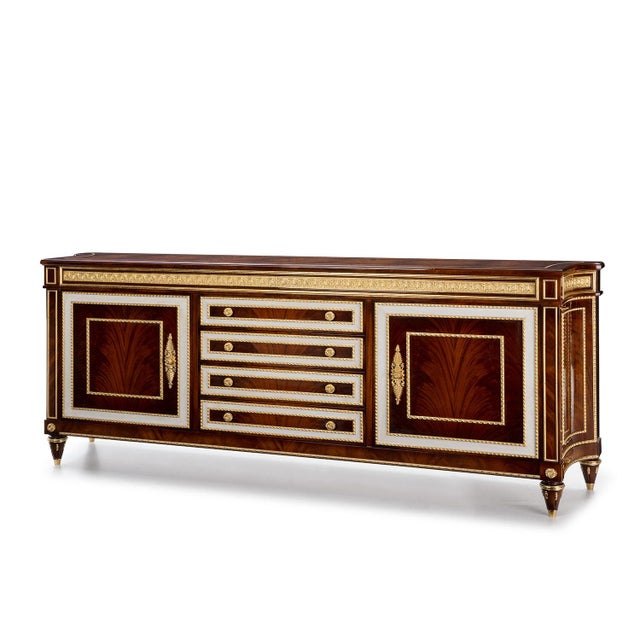 Handcrafted in Spain, the Valencia Sideboard is made from Cerejeira Palm wood with Krion accents that create a clean...