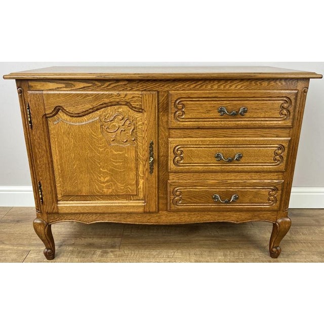 This elegant Vintage French Louis cabinet combines graceful styling with practical storage, making it a wonderful addition...