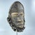 A beautiful, large mask with the famous protruding lips of the Dan carver. The trader indicated that this mask, with bells...