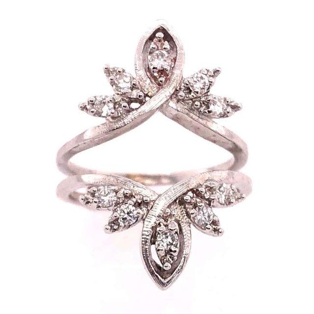 14 Karat White Gold Interlocking Engagement Ring Guard Size 6.75. 10 piece round diamonds 6 grams total weight. ring space...