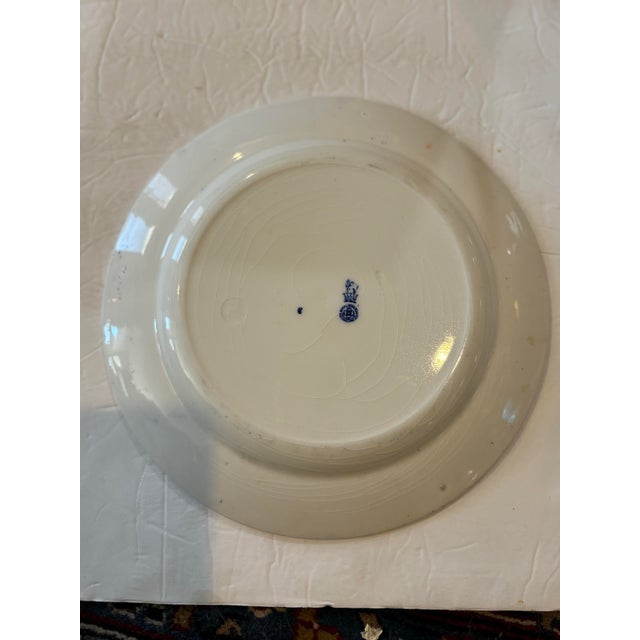 One of a set of 24 "Gibson Girls" plates , made by Royal Doulton , circa 1902-15. The series of 24 plates depicts the...