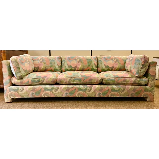 A very well-built and solid sofa in the style of Milo Baughman. Both the back and side cushions are down-filled and very...