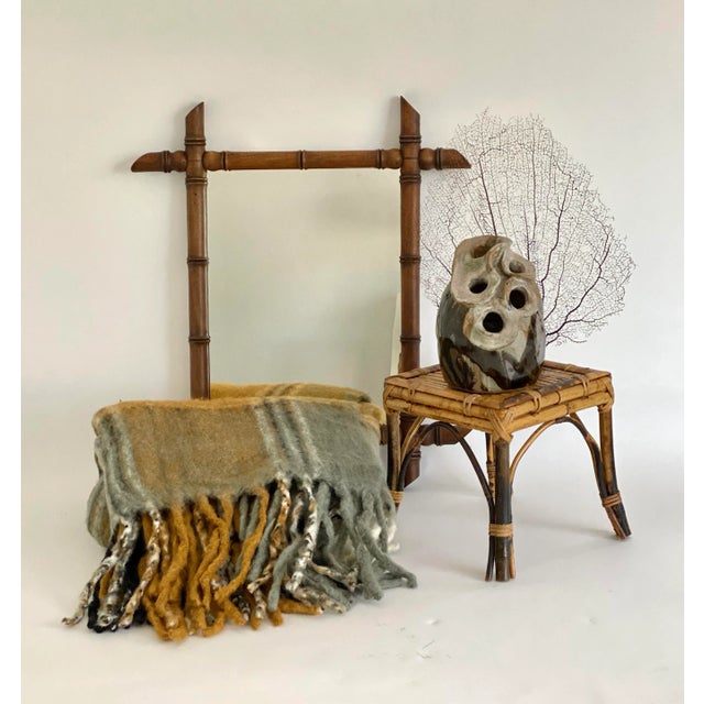 Tortoiseshell finish bamboo plant stand/table riser with unusual flanged legs. Good structural condition. A perfect size...