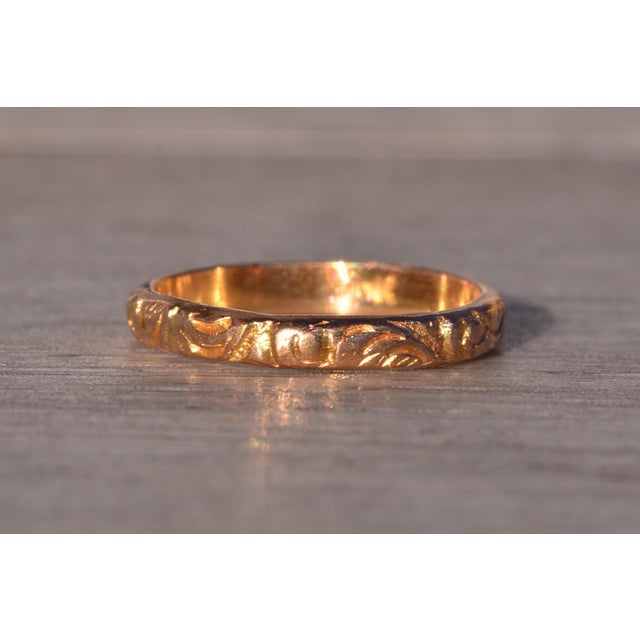 The Gromo: Antique Yellow Gold Hand Engraved Mid Finger or Child's Ring. The ring features a scrolled pattern throughout...