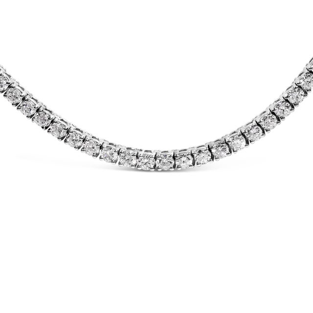 Elegance is redefined with this exquisite tennis necklace, expertly crafted from rhodium-plated 14K white gold that offers...
