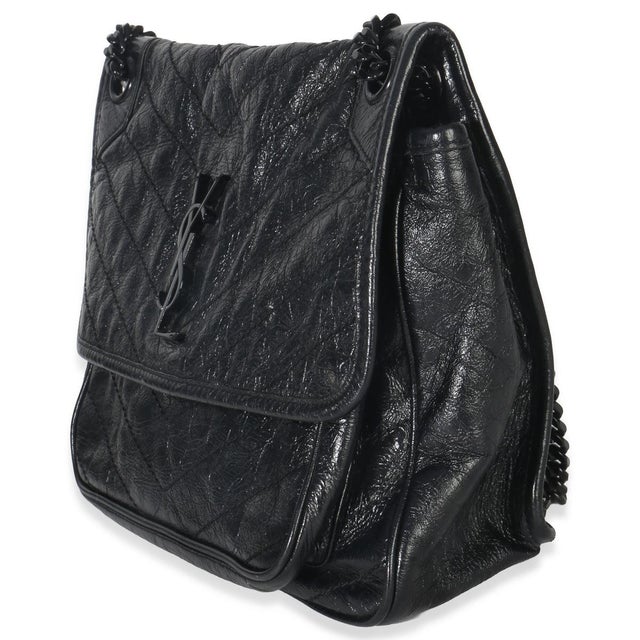 Item #: 152716 Exterior Material: Leather MSRP: 3,150 Interior Material: Fabric Size: Medium Features Interior: Two slip...