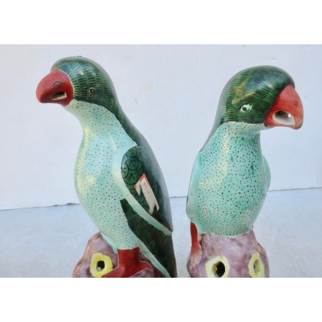 A Pair of green parrots from China in the early 20th century, a period of the 1910s-40s. A charming pair of birds with...
