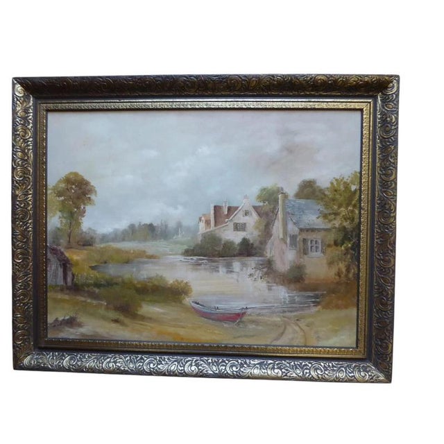 Fine Mid-20th Century Cottage by the River Landscape Oil Painting, circa 1965 Material: Oil on Board, Giltwood A charming...