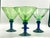 Lovely artisanal rustic yet modern hand blown martini or margarita glasses. The bowl is green glass with a subtle bubble...