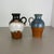 These original vintage vases was produced in the 1970s in Germany. It is made of ceramic pottery in fat lava optic. Super...