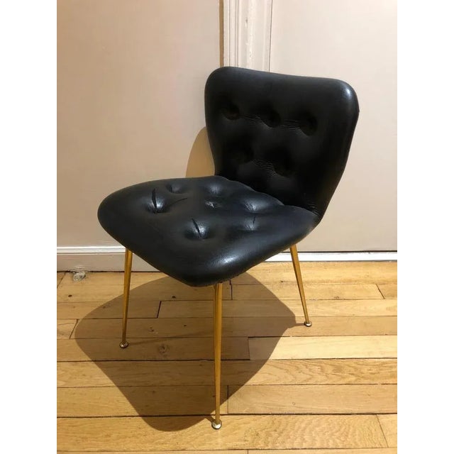 sitting in skai, piet in golden metal This piece is attributed to the mentioned designer/maker. It has no attribution mark...