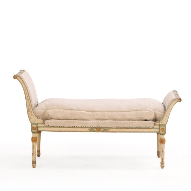 This charming 1920's diminutive chaise lounge beautifully showcases the classic elegance of the French Directoire style...