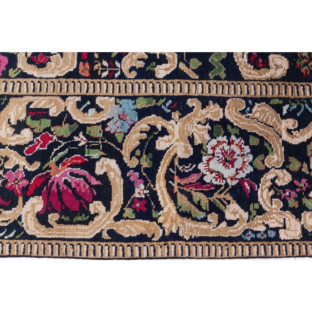 This exquisite antique Karabagh rug, dating to the late 19th century, is a masterclass in Caucasian weaving influenced by...