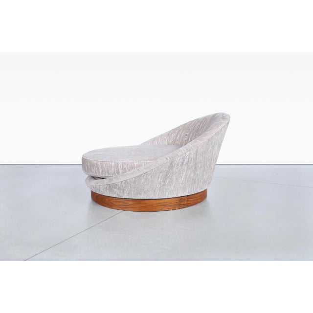 Mid-century modern walnut “Satellite” lounge chair designed by Milo Baughman in the 1970s, a sculptural statement piece...