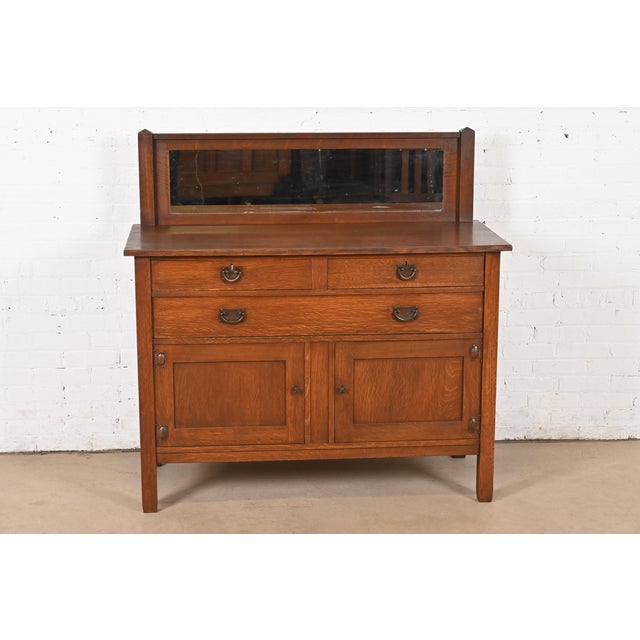 A gorgeous antique Mission or Arts & Crafts period sideboard, buffet server, or bar cabinet By Stickley Brothers USA,...