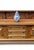 An imposing and beautifully preserved 20th-century carved oak buffet sideboard, distinguished by its architectural...