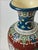 This Art Nouveau enamelled faience vase, produced in France around 1910 and likely originating from the Longwy region, is...