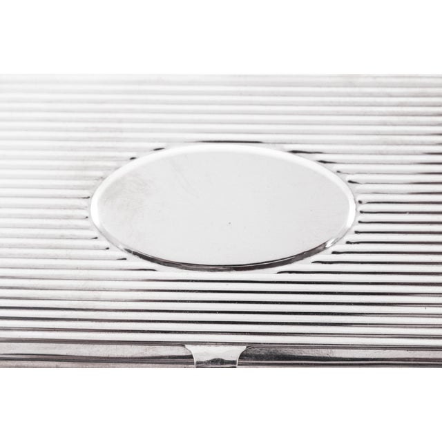 A (unisex) sterling silver card holder can be used to hold business cards, credit cards, a drivers license and even cash....