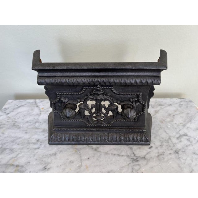 Cast iron tidy Betty fireplace surround