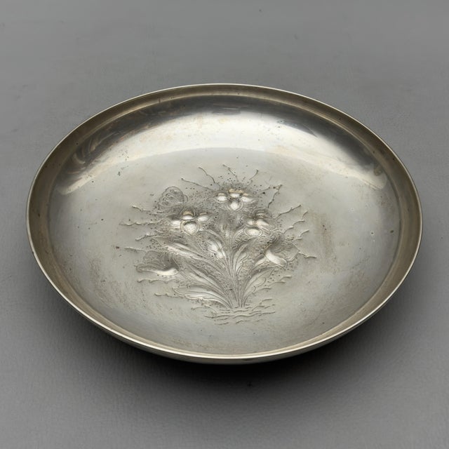 A highly prized solid silver centerpiece dating back to the 1960s. A luxurious piece of masterful craftsmanship, signed by...