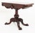 This Impressive Mahogany Irish Card Table Stands Upon Swept Legs with Carved Knees and Carved Lions Paw Feet. Circa 1860...