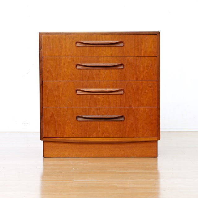 This mid-century dresser nightstand was produced by G Plan during the 1960s. Featuring four spacious drawers with iconic...