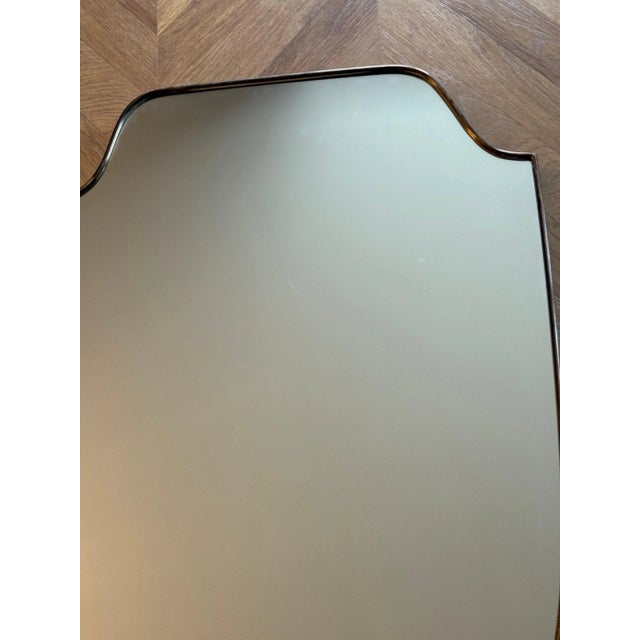 These highly decorative mirrors were made in Italy in the 1950s. Typical of the design of this period, they are entirely...