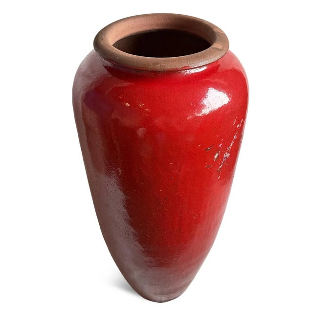 Tall red vintage ceramic urn. Perfect for inside or outside in the garden. Red distressed patina and thick and heavy...
