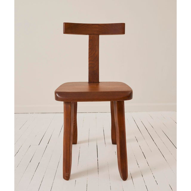 Finnish designer Olavi Hanninen's brutalist style T chair in Solid Elm. The rustic simplicity of this chair makes for an...