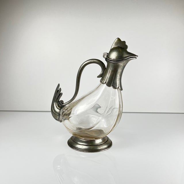 Superb ewer or carafe in thick molded glass and pewter mount, probably made between the 1930s and 1950s, in a late Art...