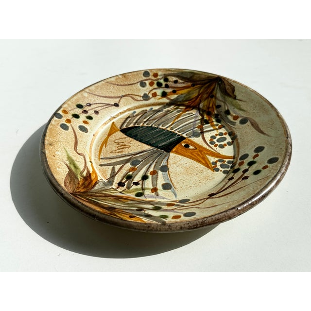 Handmade and hand-painted ceramic art plate Ceramicarte Cascais Portugal, signed and with an abstract artistic fish motif,...