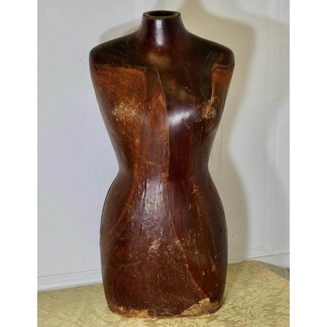 A Quirky Retro Faux Wooden Mannequin This beautiful mannequin or tailors dummy torso is covered is finished in wood...