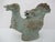 Chinese ritual bronze Guang wine vessel, a type of ewer primarily used during the Shang and Western Zhou dynasties. This...
