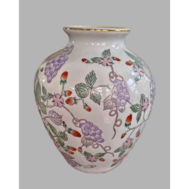 Beautiful vintage porcelain flower vase with a bright hand-painted design of lavender grapes, red strawberries and lovely...