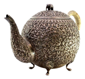Silver Kettle with Embossed Floral and Plant Motifs