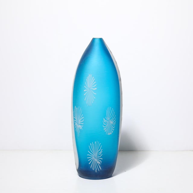 A remarkable Mid-Century Modernist hand-blown Murano glass vase, featuring intricate battuto texturing and stylized...