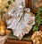 Charming vintage cast metal wall plaque or decorative tray featuring a winged fairy seated upon a large textured leaf...