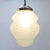 An elegant French Art Deco pendant lamp from the 1940s, featuring a sculptural frosted glass shade with a softly...