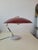 Designed in 1955 and produced by Stilux Milano. Circular base in Carrara marble, brass stem with 3 joints, red acrylic...