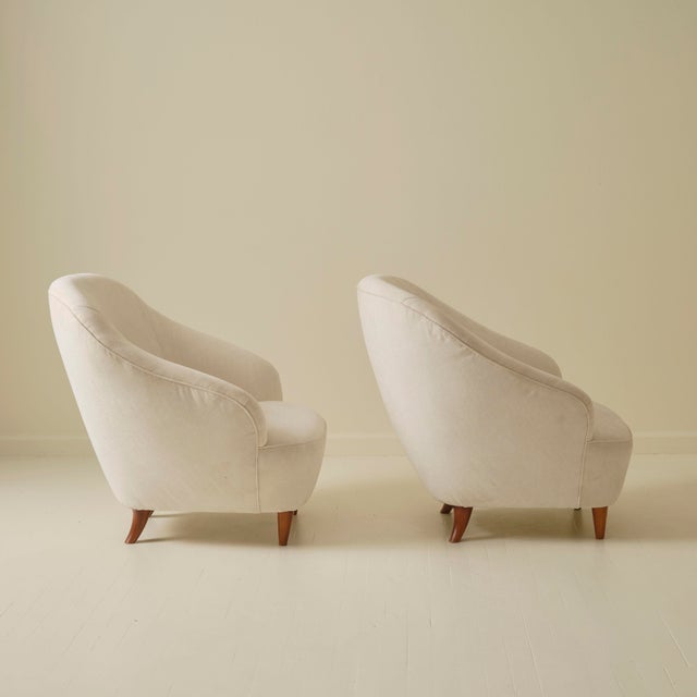 Pair of armchairs by Gio Ponti, produced by Casa & Giardino in Italy during the 1940s. Crafted with turned wood frames and...